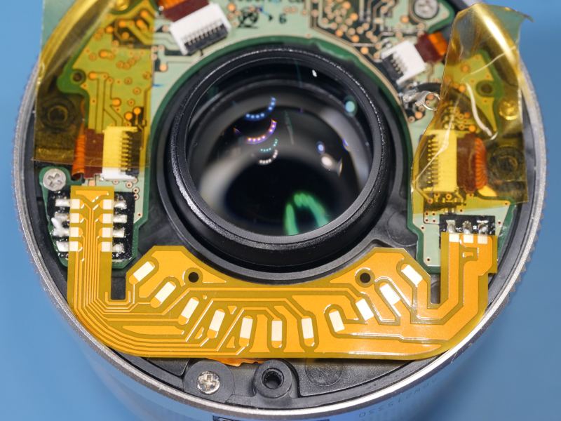 closeup of flex PCB inside lens properly lined up.