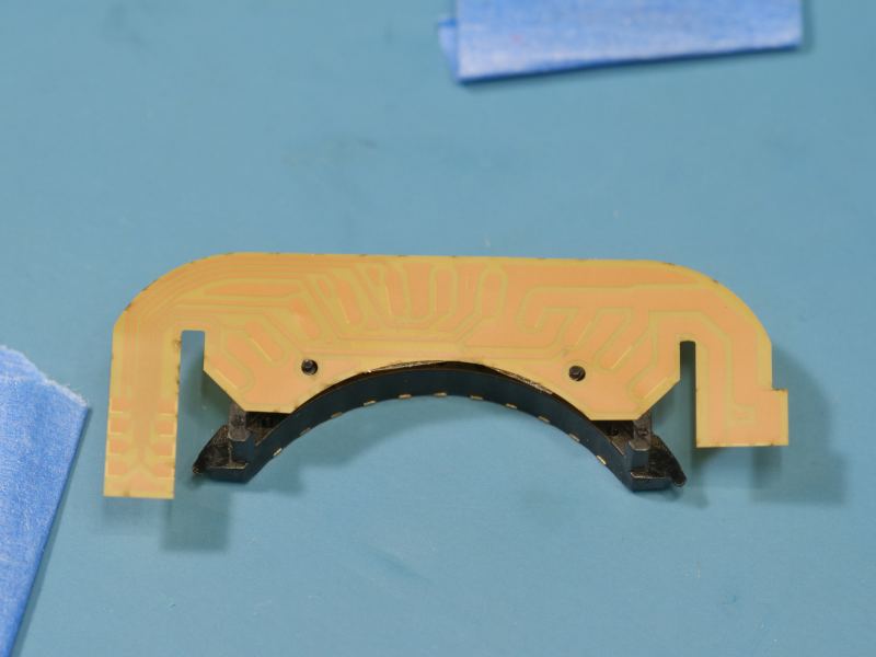 flex PCB aligned to the back of the lens contact block using double sided tape.